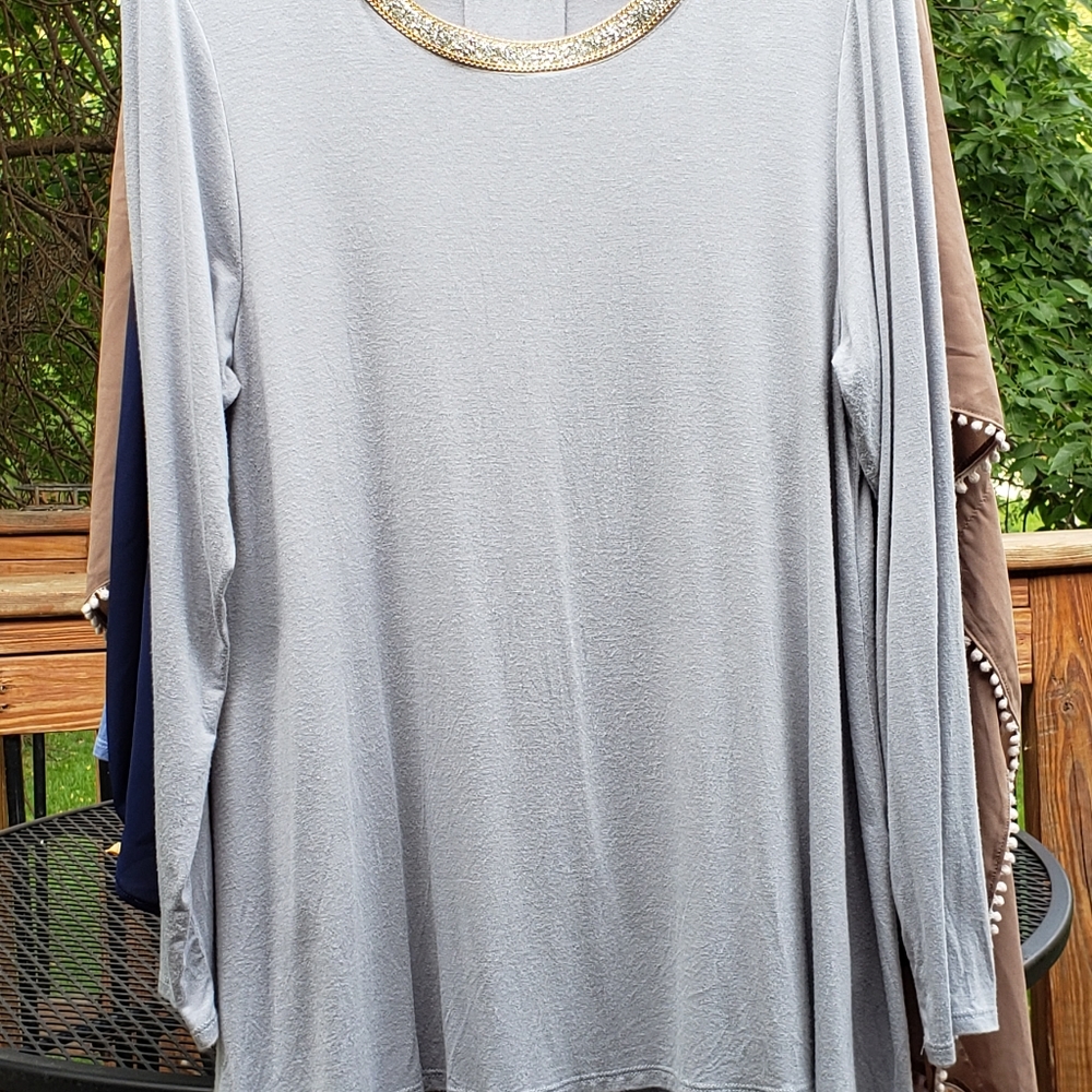 Glamour Defined high low beaded long sleeved top